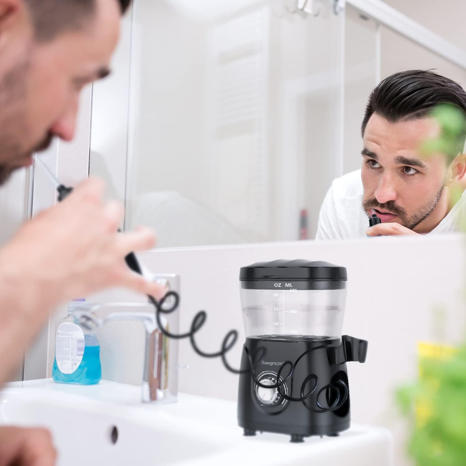 A practical detail such as handling, nozzle design, or water delivery hardware.